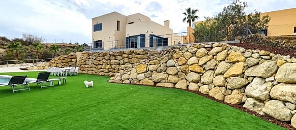 Villa garden and terrace with pool loungers